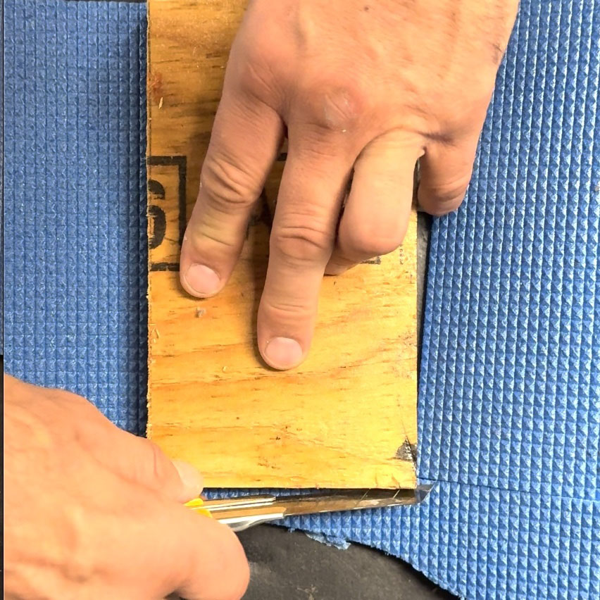 Cutting the foam padding for canoe pads